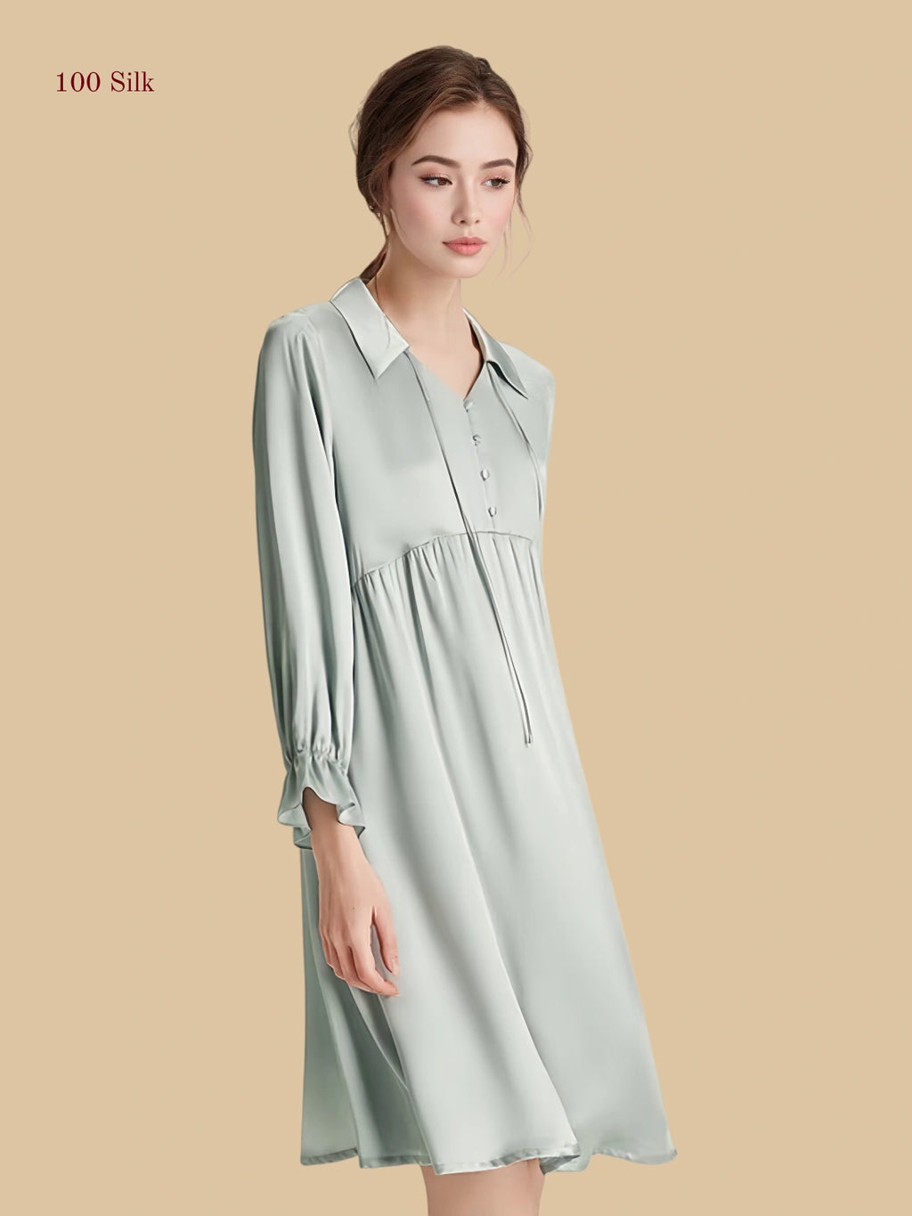 Blue 16mm silk lounge dress side view with loose drape and gathered sleeve cuffs