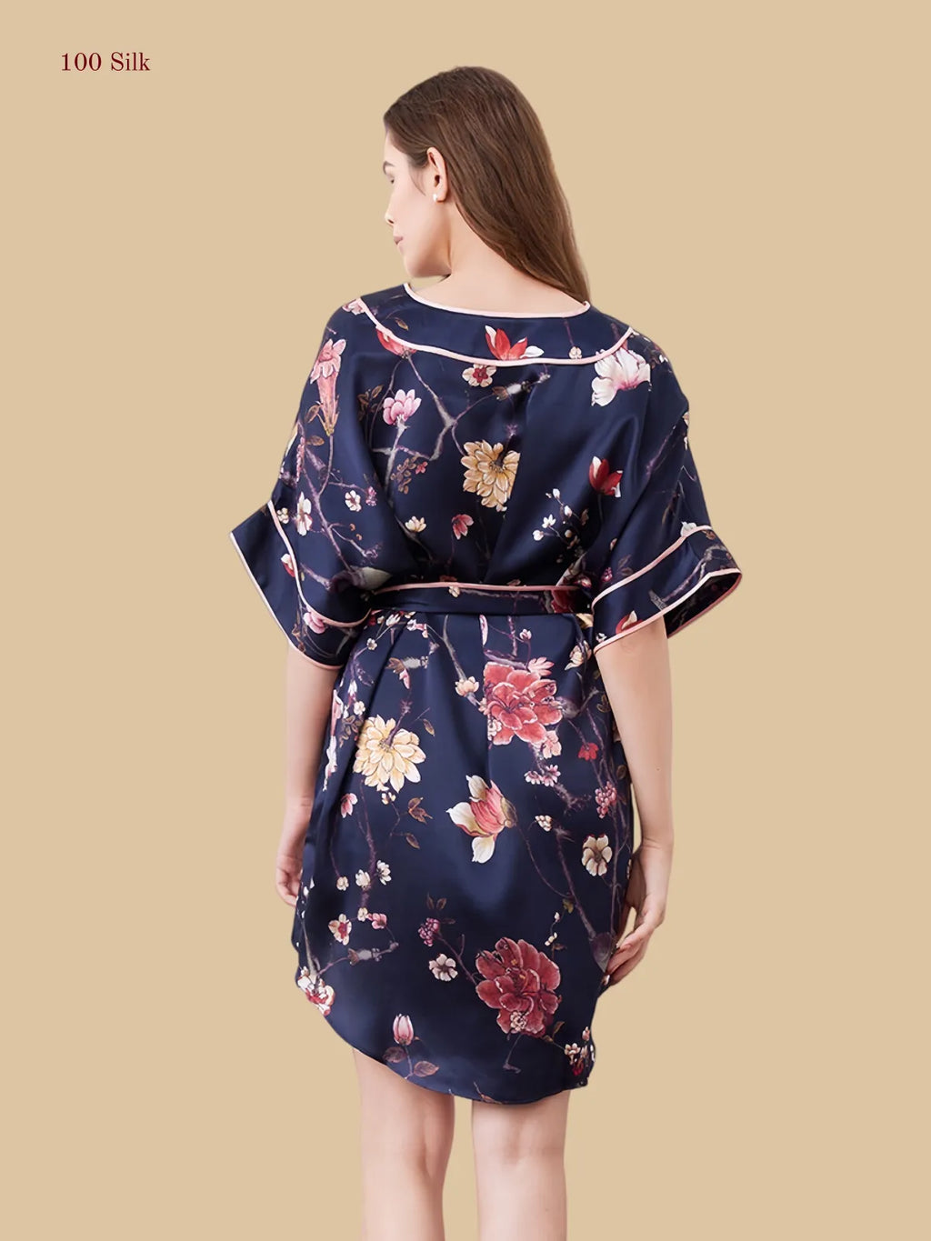 Navy floral 19mm silk lounge dress back view with curved hem and roomy drape