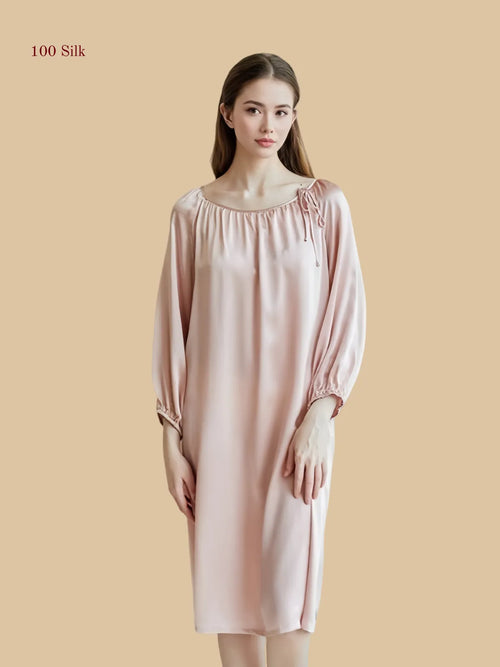 Pink 16mm silk lounge dress front view with gathered drawstring neckline and elastic-cuff long sleeves