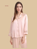 Pink 16mm lace-shoulder pajama set detail view with lace shoulder panel and cuff trim