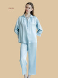 Light blue 19mm silk homewear set front view with tie-neck open collar and full-length straight pants