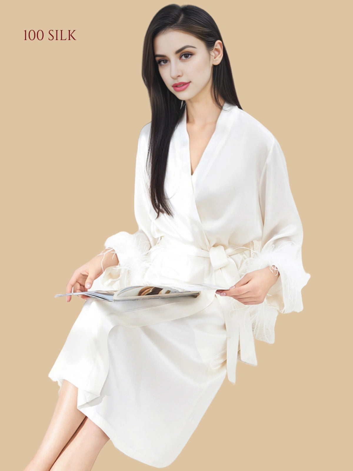 Ivory white 19mm silk wrap lounge set seated view with feather cuffs and short inner chemise