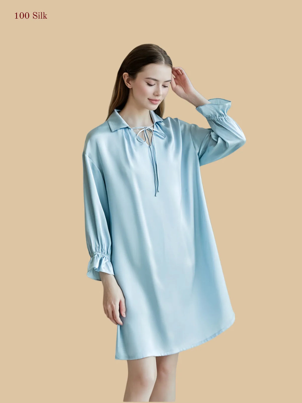 Light blue 16mm silk sleep dress front view with tie collar and loose long sleeves