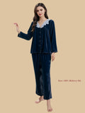 Navy velvet button-front set front view with lace-trim V neckline and high-waisted straight pants