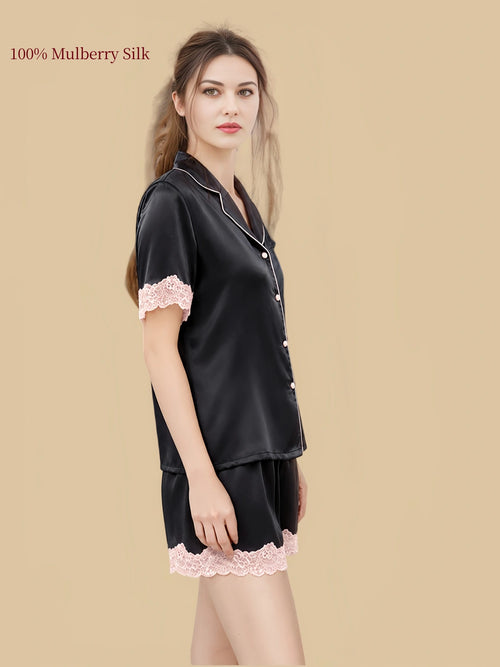 Side view of an Agate Black 16 Momme silk short set with notched collar and lace hems