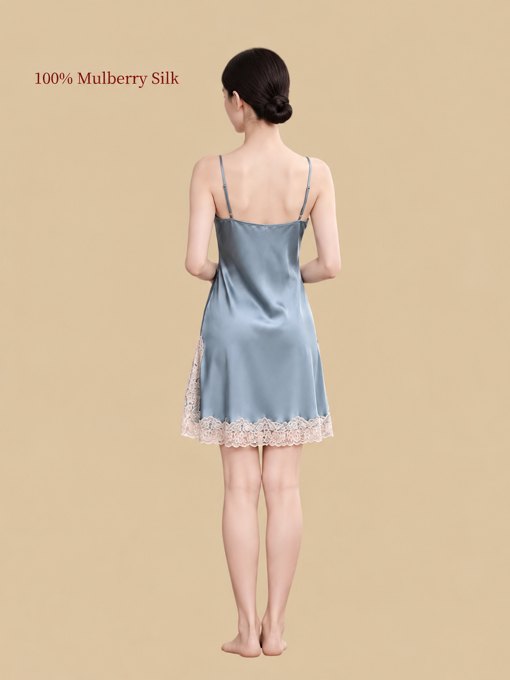 Back view of Clear Sky Blue silk slip dress with slender adjustable shoulder straps and scalloped ivory lace hem.