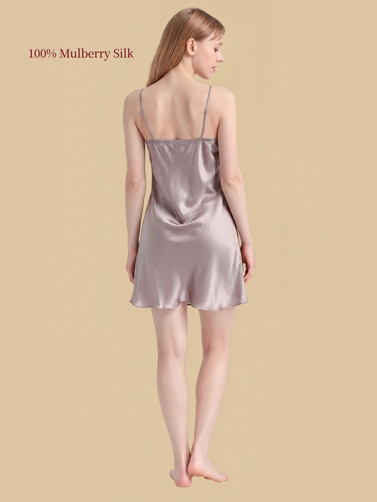 Back view of Gray silk nightdress showing straight back neckline, adjustable shoulder straps and gently flared hem.