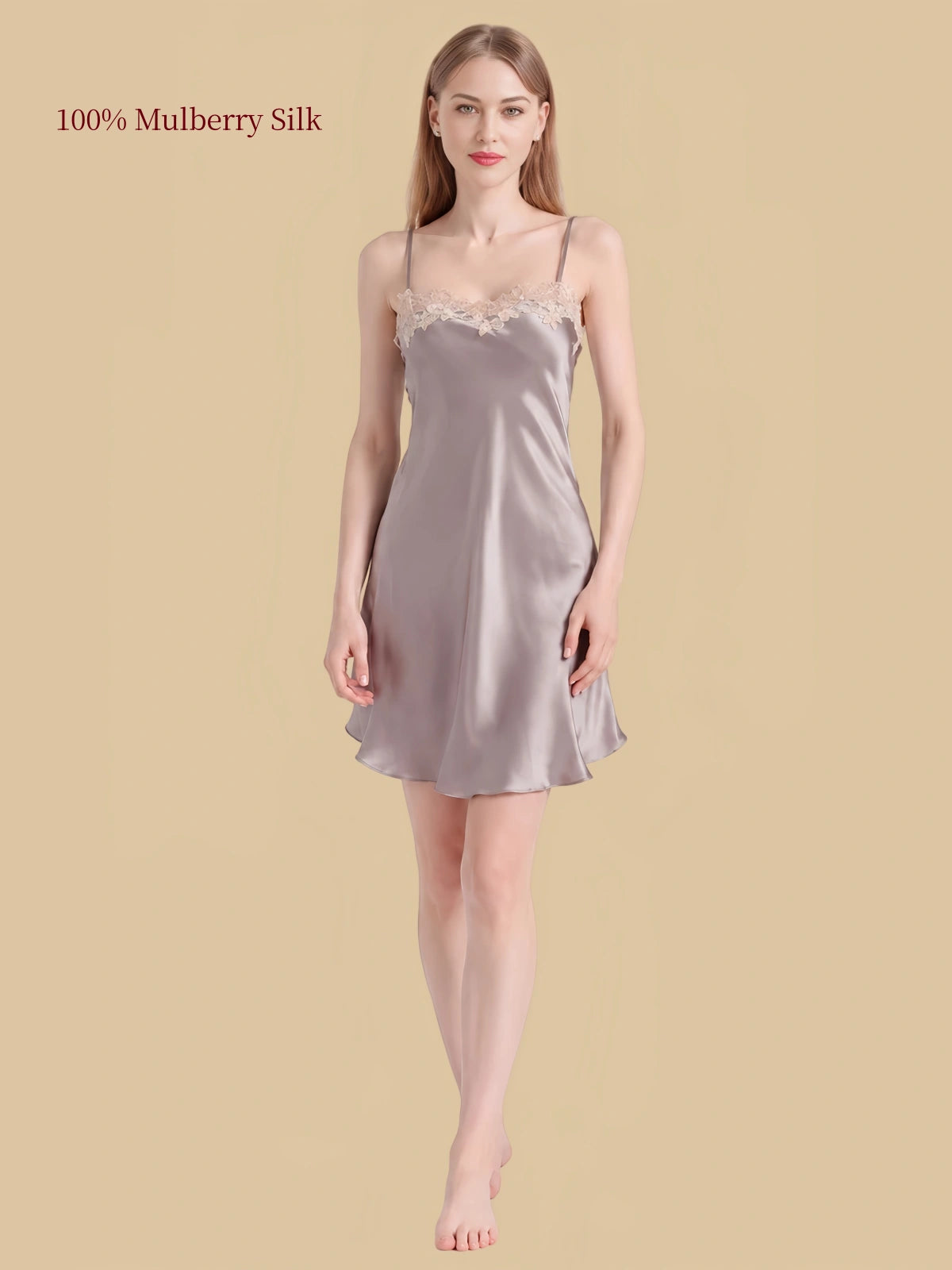 Front view of Gray silk cami nightdress with adjustable thin straps, ivory floral lace neckline and flared short hem.