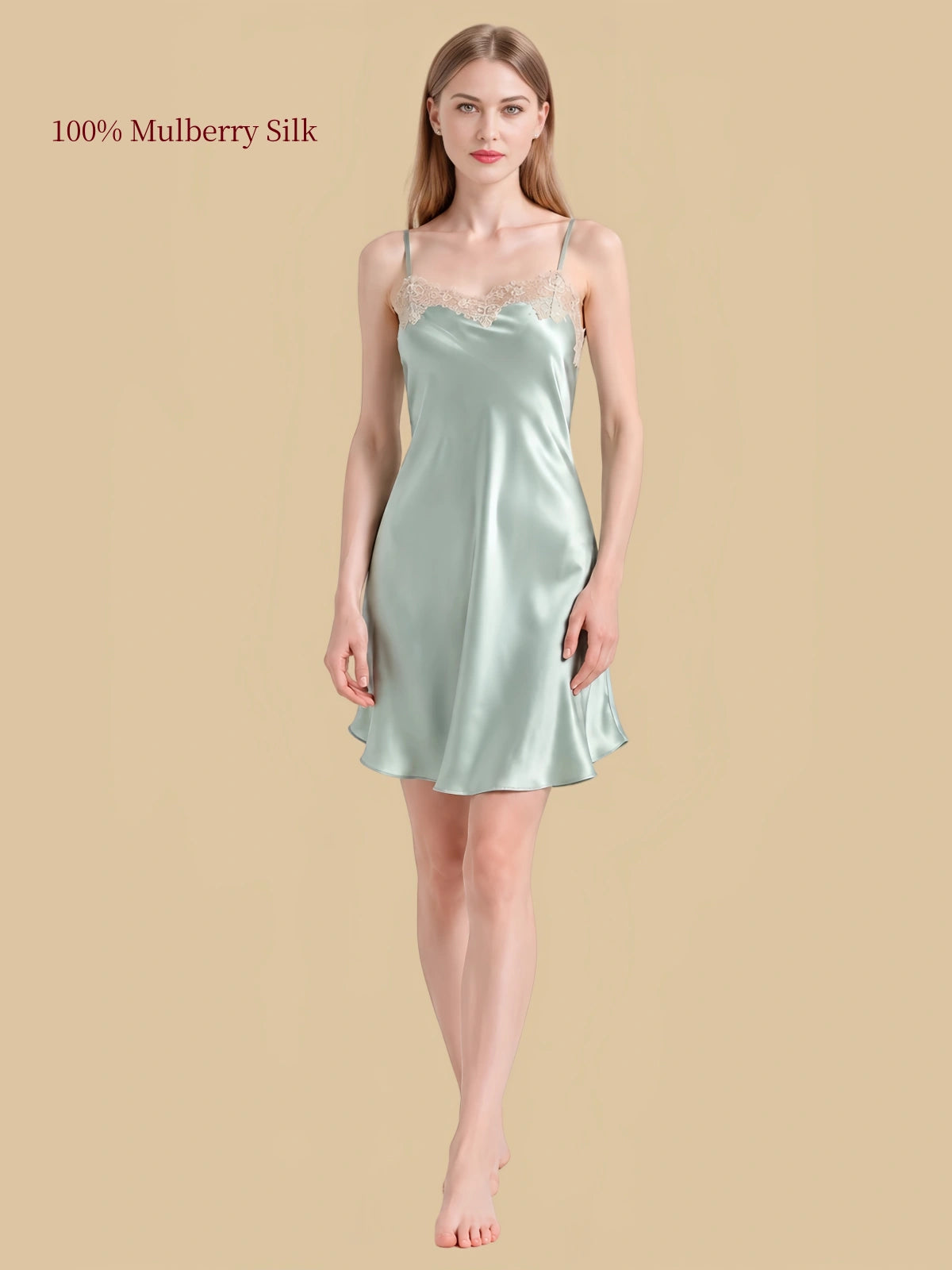 Front view of Jade Green silk cami nightdress with floral lace neckline, adjustable straps and softly flowing short skirt.