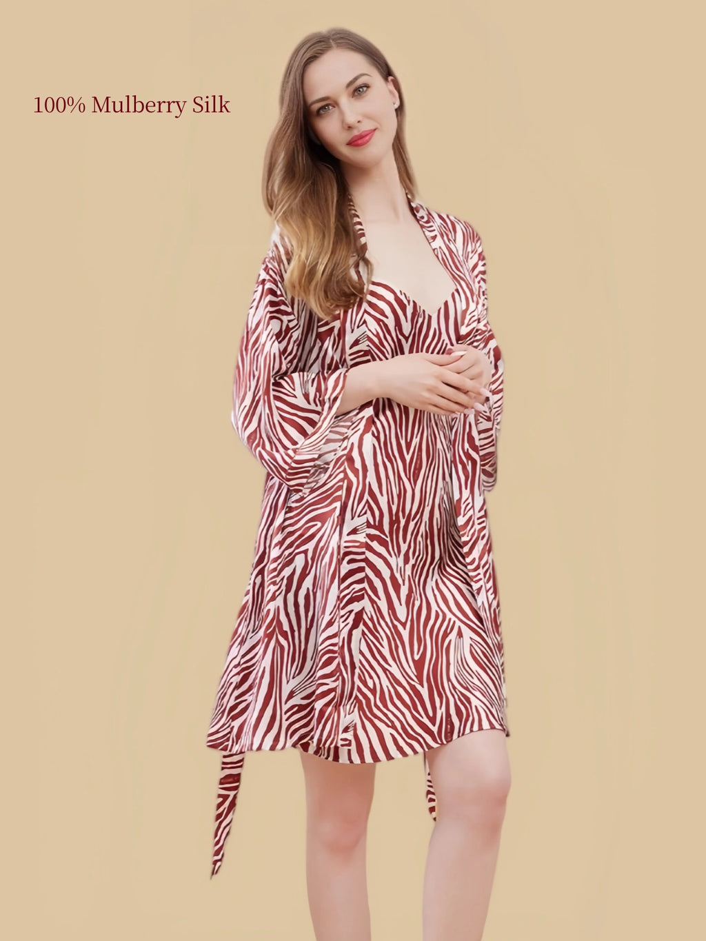 Red-and-white zebra print silk cami dress paired with a matching open-front robe and flowing short hem.