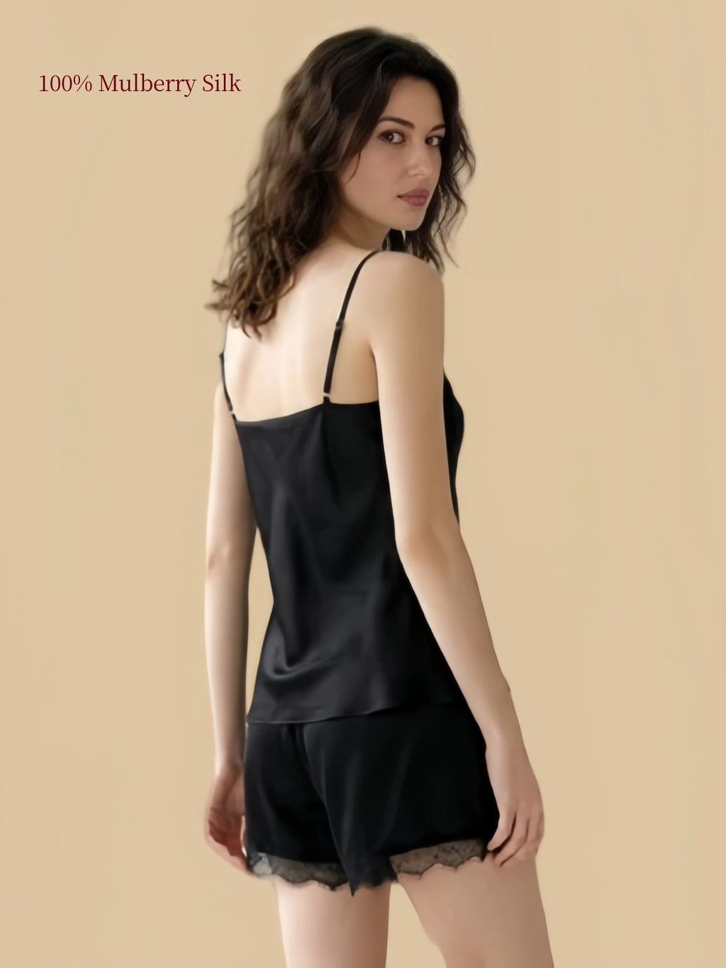 Back view of an Agate Black 19 Momme silk cami and shorts set with adjustable straps and lace hems
