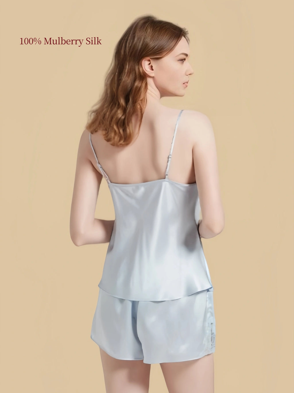 Back view of an Aqua Blue 19 Momme silk cami and shorts set with adjustable straps