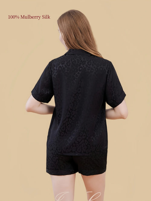 Back view of the Black Check mulberry silk short-sleeve shirt and matching check shorts