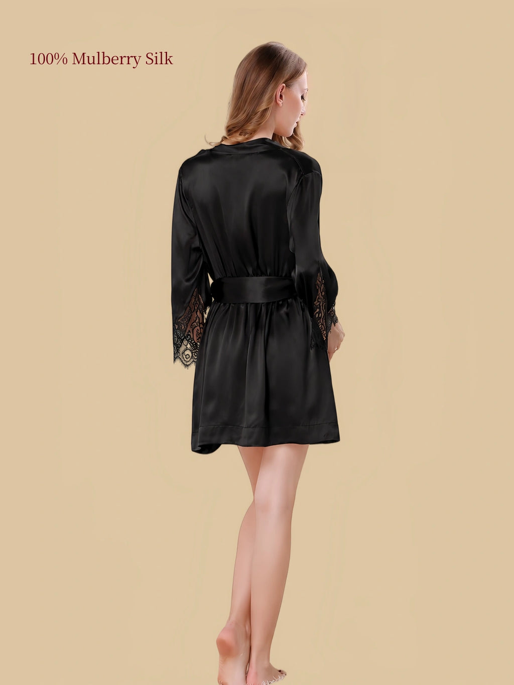 Back view of a black mulberry silk robe with three-quarter lace-trimmed sleeves and a matching waist belt.