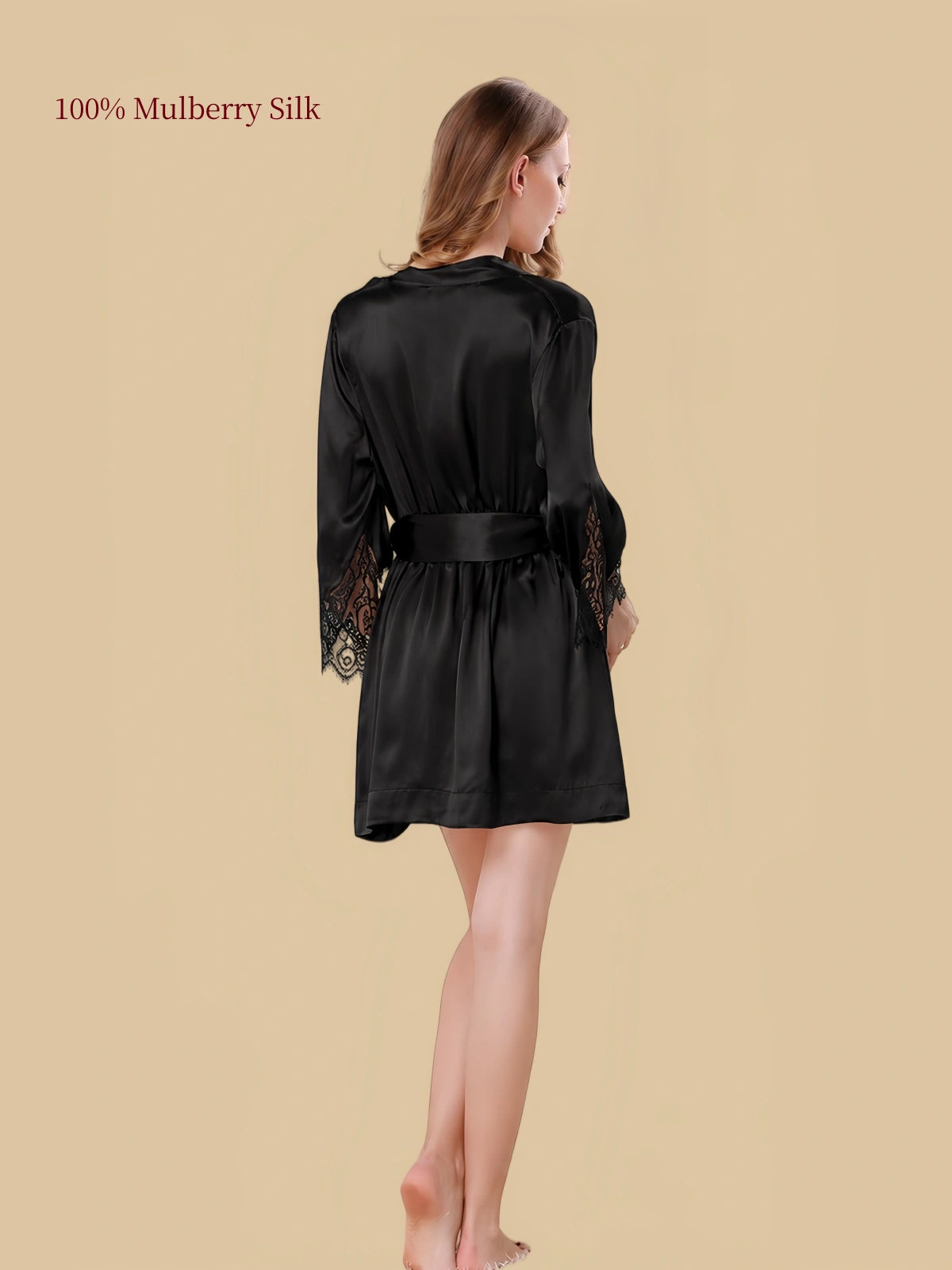 Back view of a black mulberry silk robe with three-quarter lace-trimmed sleeves and a matching waist belt.
