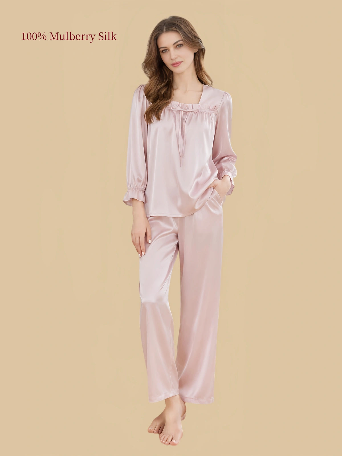 Silkgala Blush Pink mulberry silk two-piece pajamas featuring a ruched square neckline, front tie detail, ruffled sleeve cuffs and relaxed pants.