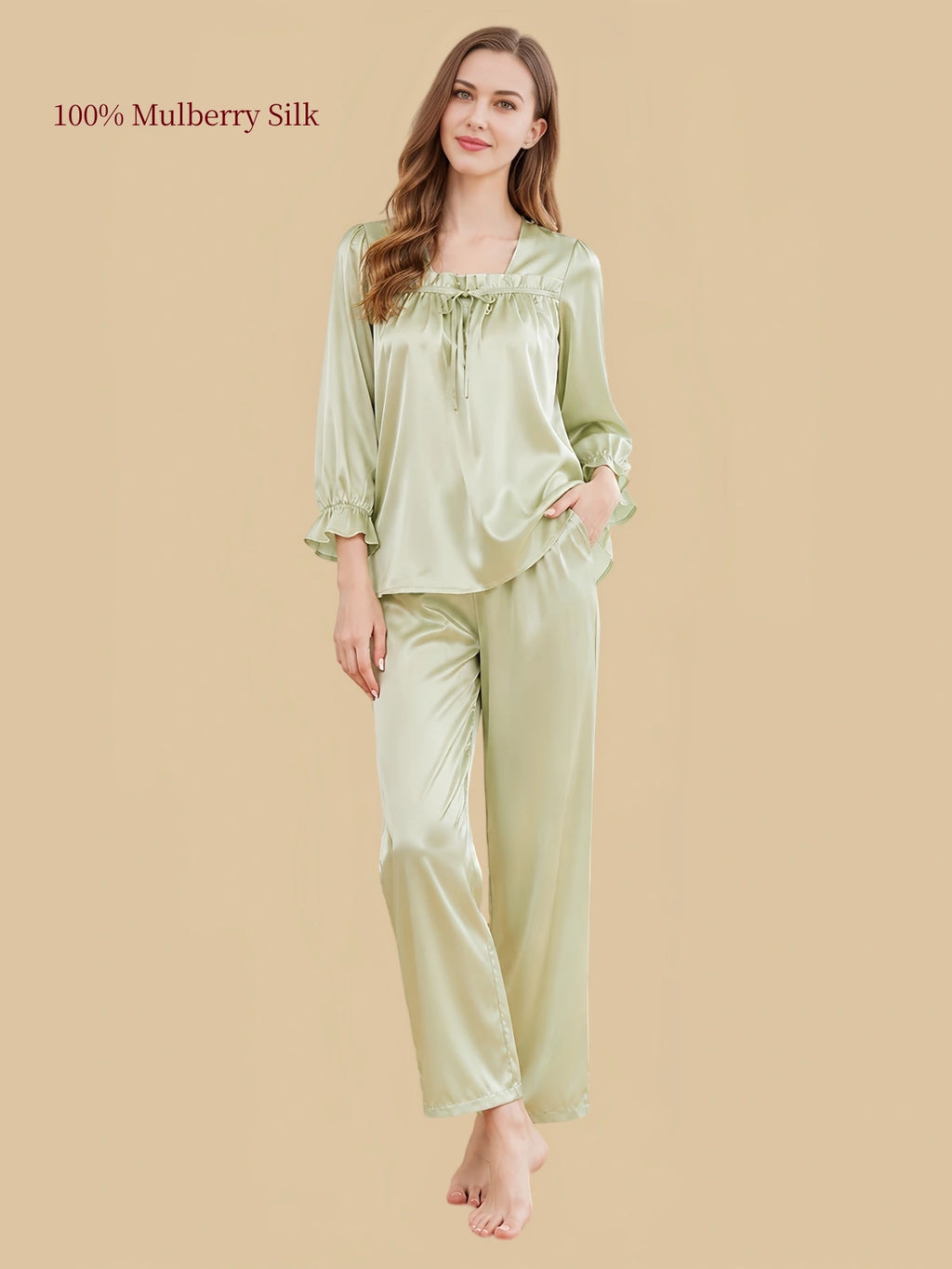 Silkgala Pale Pistachio Green 19 Momme silk pullover pajamas with a ruched square neckline, decorative tie, ruffled cuffs and matching straight-leg pants.