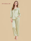 Silkgala Pale Pistachio Green 19 Momme silk pullover pajamas with a ruched square neckline, decorative tie, ruffled cuffs and matching straight-leg pants.