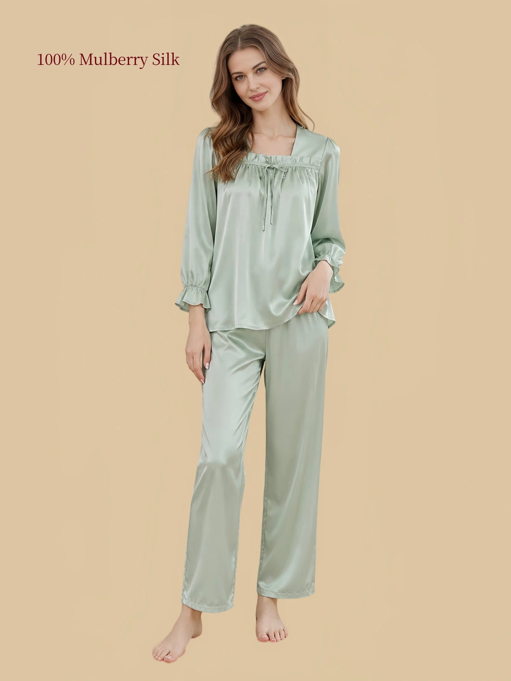 Model wearing Silkgala Soft Sage Green 19 Momme mulberry silk pajamas with a gathered square neckline and relaxed matching pants.