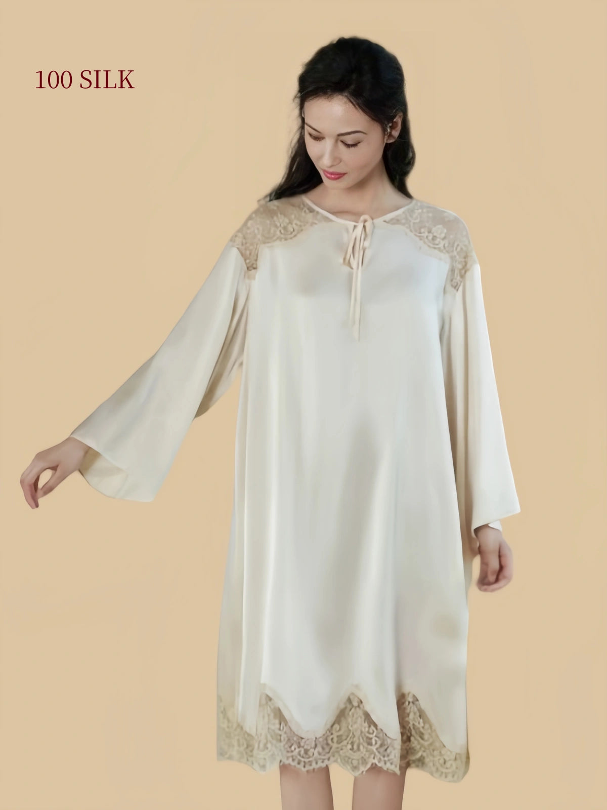 Front view of Pear Blossom White 22 momme mulberry silk nightdress with tie neckline, long wide sleeves and lace hem