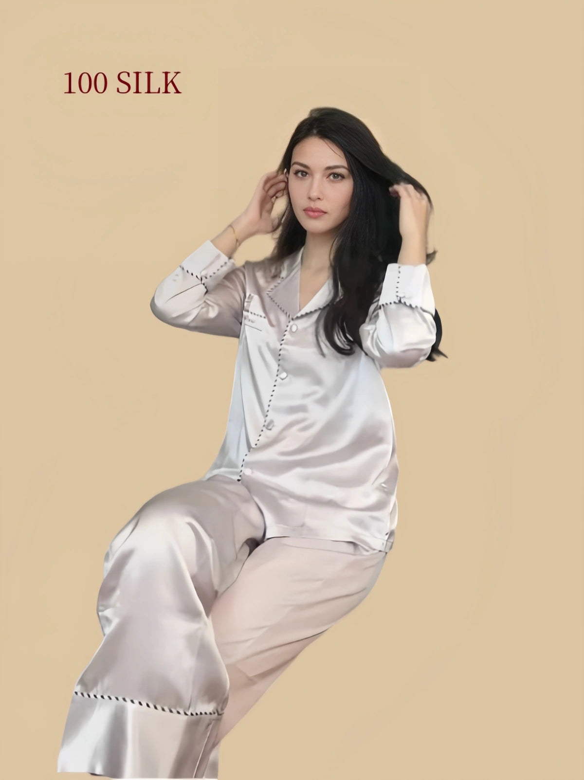 Silkgala 22 momme mulberry silk pajama set in Apricot Pink with relaxed wide leg pants seated view