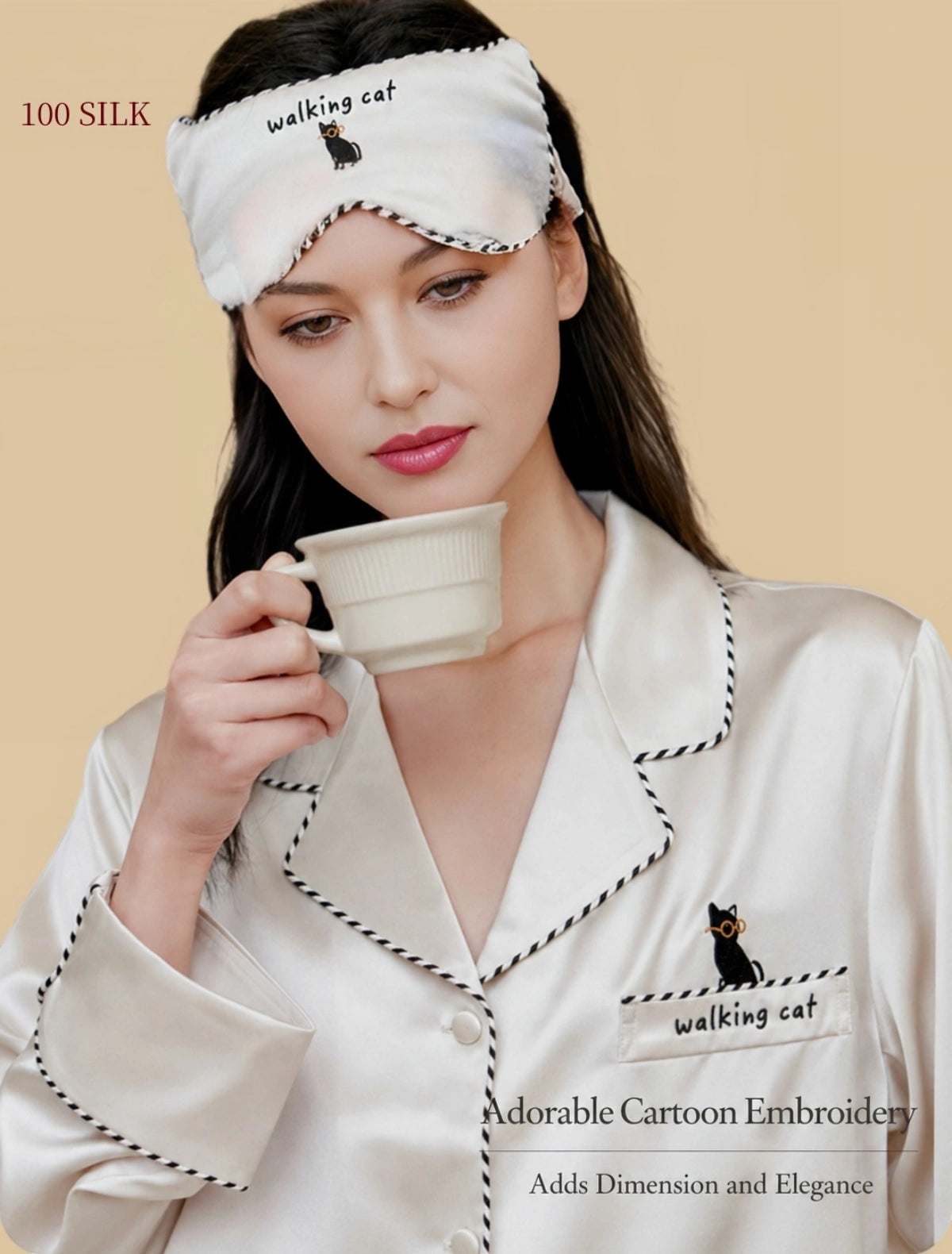 Close-up of Silkgala 22 momme silk pajama set featuring cat embroidery contrast piping and refined collar details