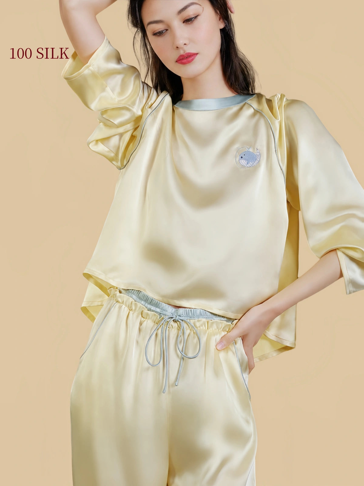 Silkgala 22 momme silk pajama set showing whale embroidery contrast neckline and adjustable drawstring waist