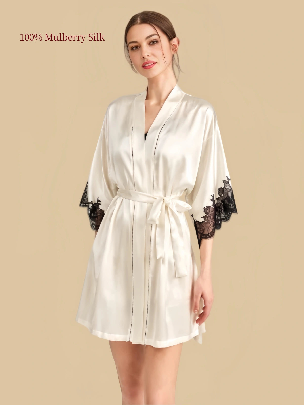 Cream White silk wrap robe with black floral lace cuffs, decorative front trim and matching waist belt.