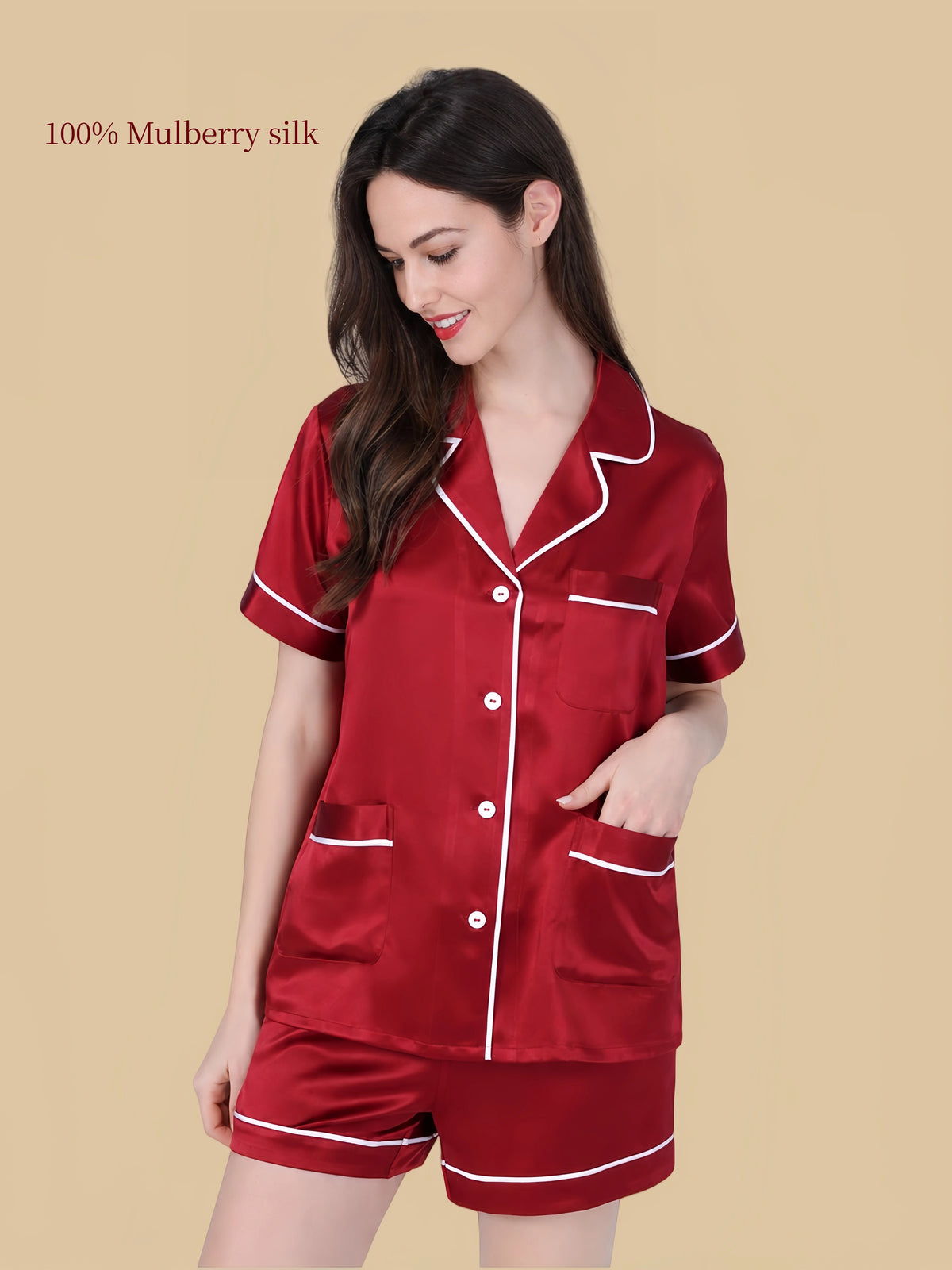 Angled front view of Silkgala 25 Momme silk lounge short set in Burgundy with contrast piping and patch pockets