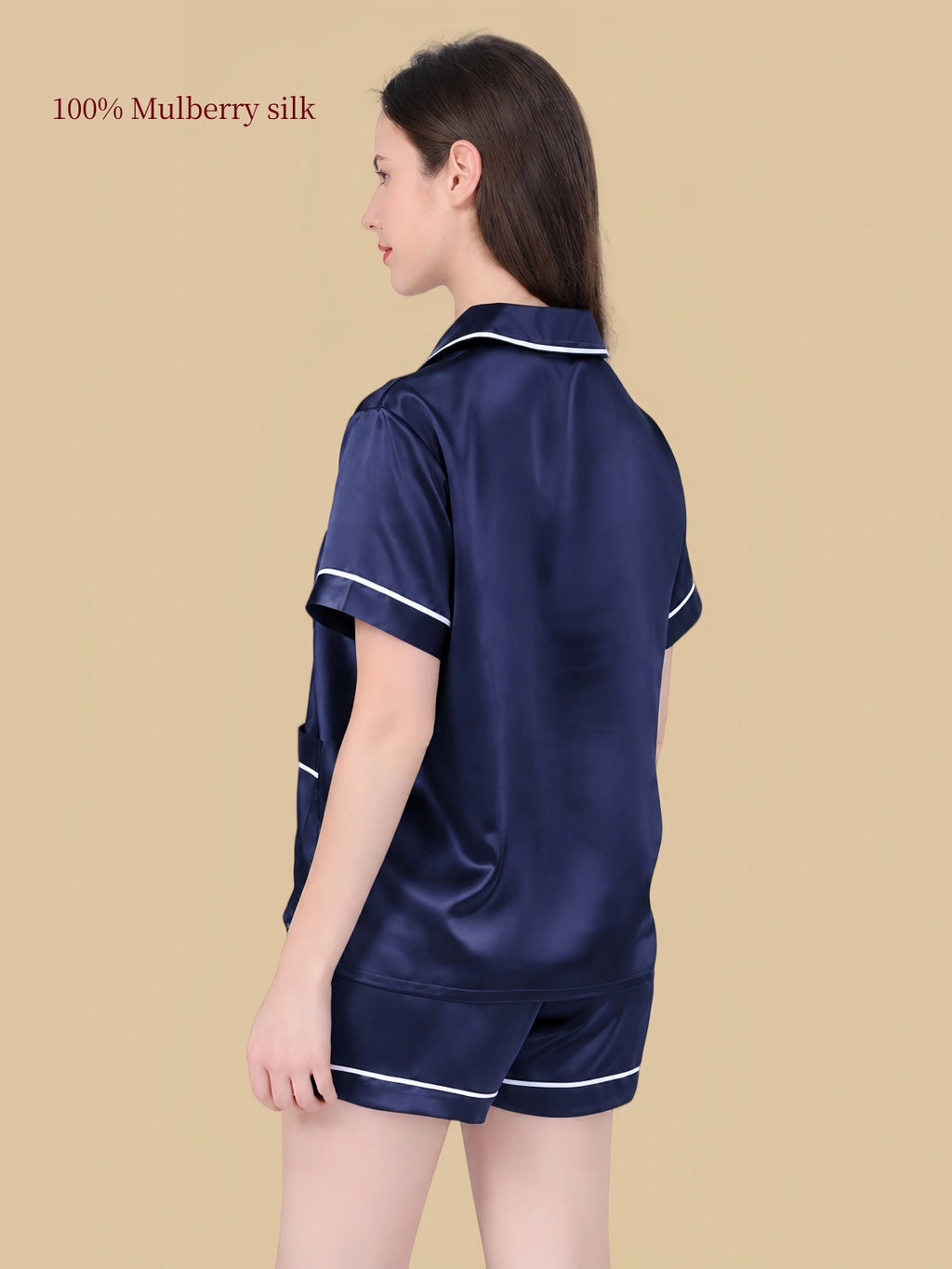 Back view of Silkgala 25 Momme silk lounge short set in Navy Blue with contrast piping on the collar, sleeves and shorts