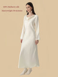 Silkgala 30 momme Ivory White mulberry silk cowl neck dress angled view with long sleeves and curved hem