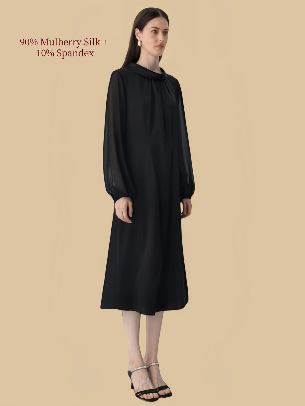 Side view of Silkgala black 90% mulberry silk and 10% spandex midi dress with round neck, long sleeves, and fluid silhouette.