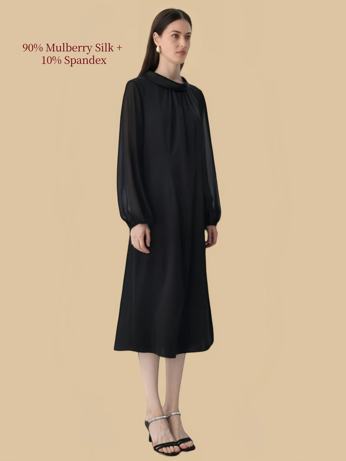 Side view of Silkgala black 90% mulberry silk and 10% spandex midi dress with round neck, long sleeves, and fluid silhouette.