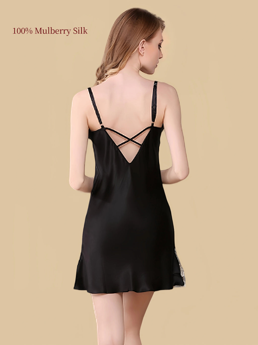 Back view of a black mulberry silk slip nightgown featuring a V-shaped open back and crossed straps.