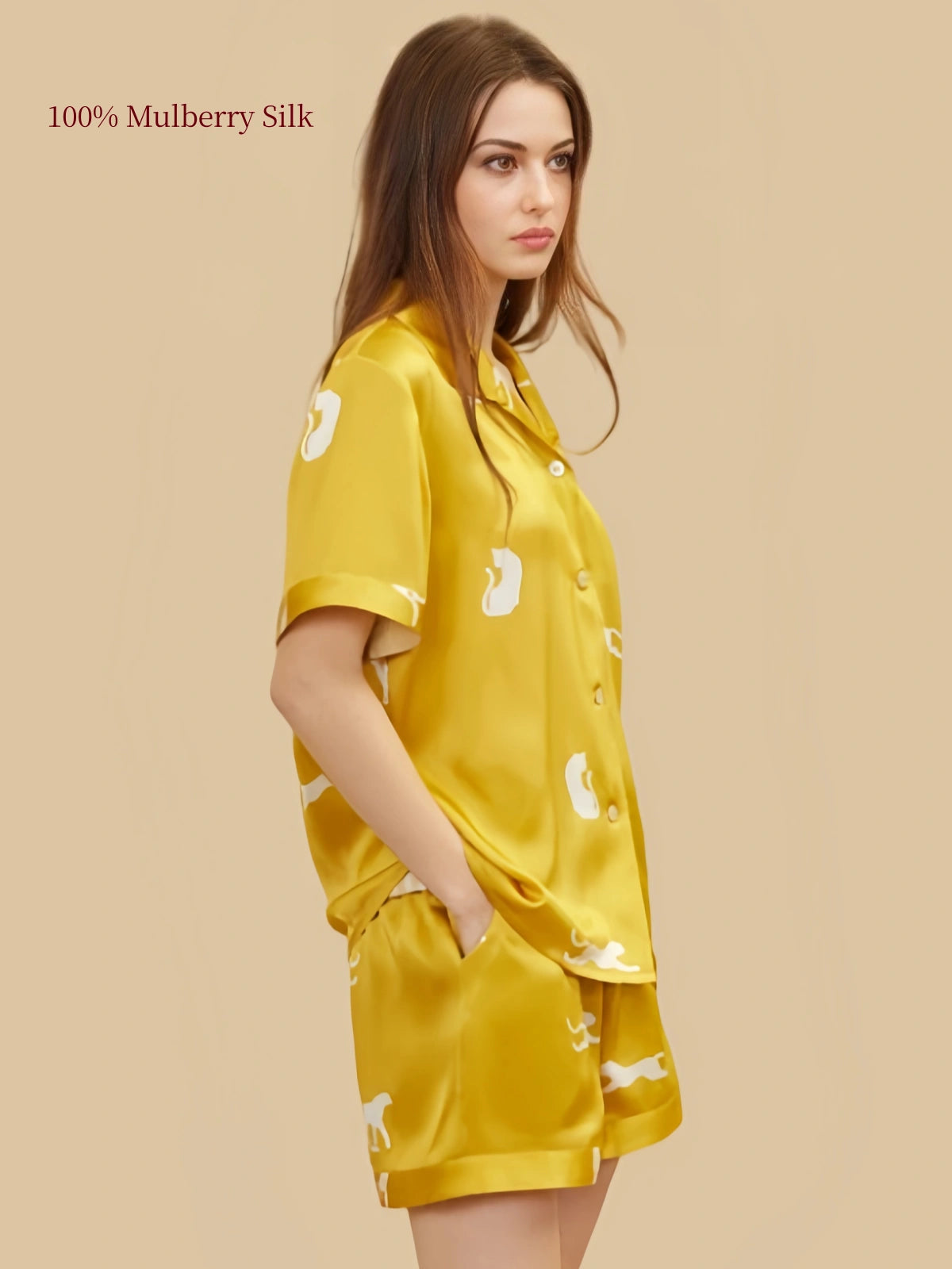 Side view of Gold leopard print silk short set with side pockets