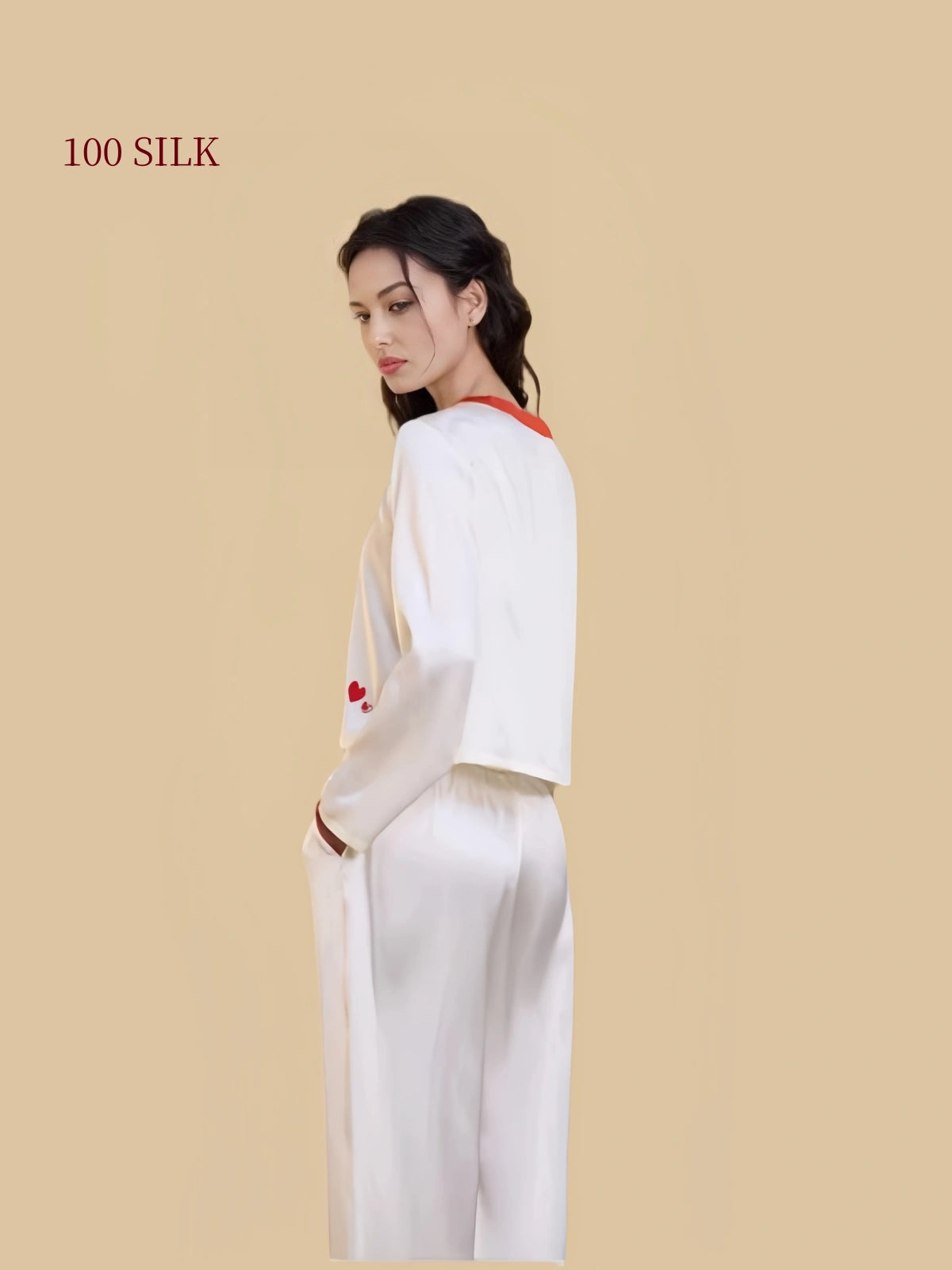 Ivory white 19mm silk pajamas side and back view showing the relaxed pullover top and wide-leg pants