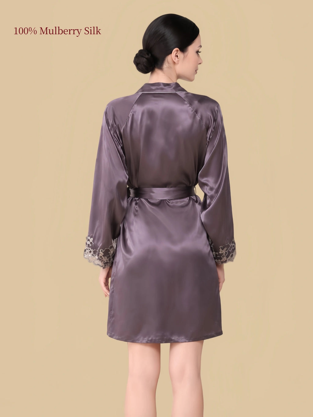 Back view of a purplish-grey mulberry silk robe showing the waist belt and lace-trimmed long sleeves.