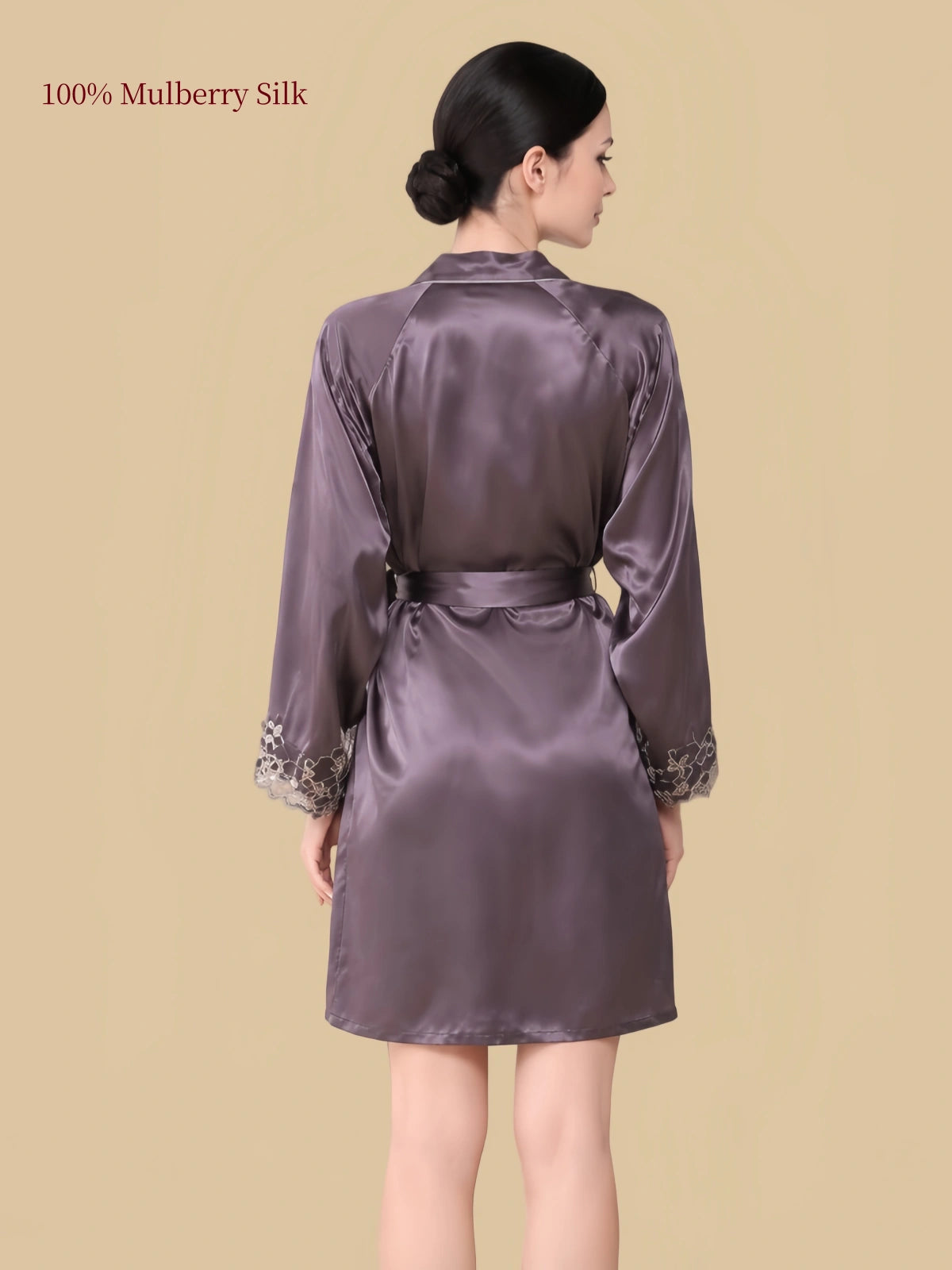 Back view of a purplish-grey mulberry silk robe showing the waist belt and lace-trimmed long sleeves.