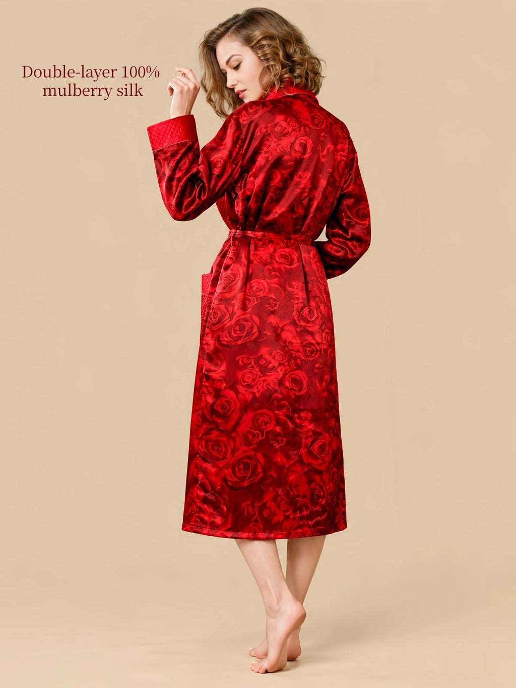 Back view of Silkgala Red Rose 22 Momme mulberry silk robe showing the full rose jacquard pattern, long sleeves and waist belt.