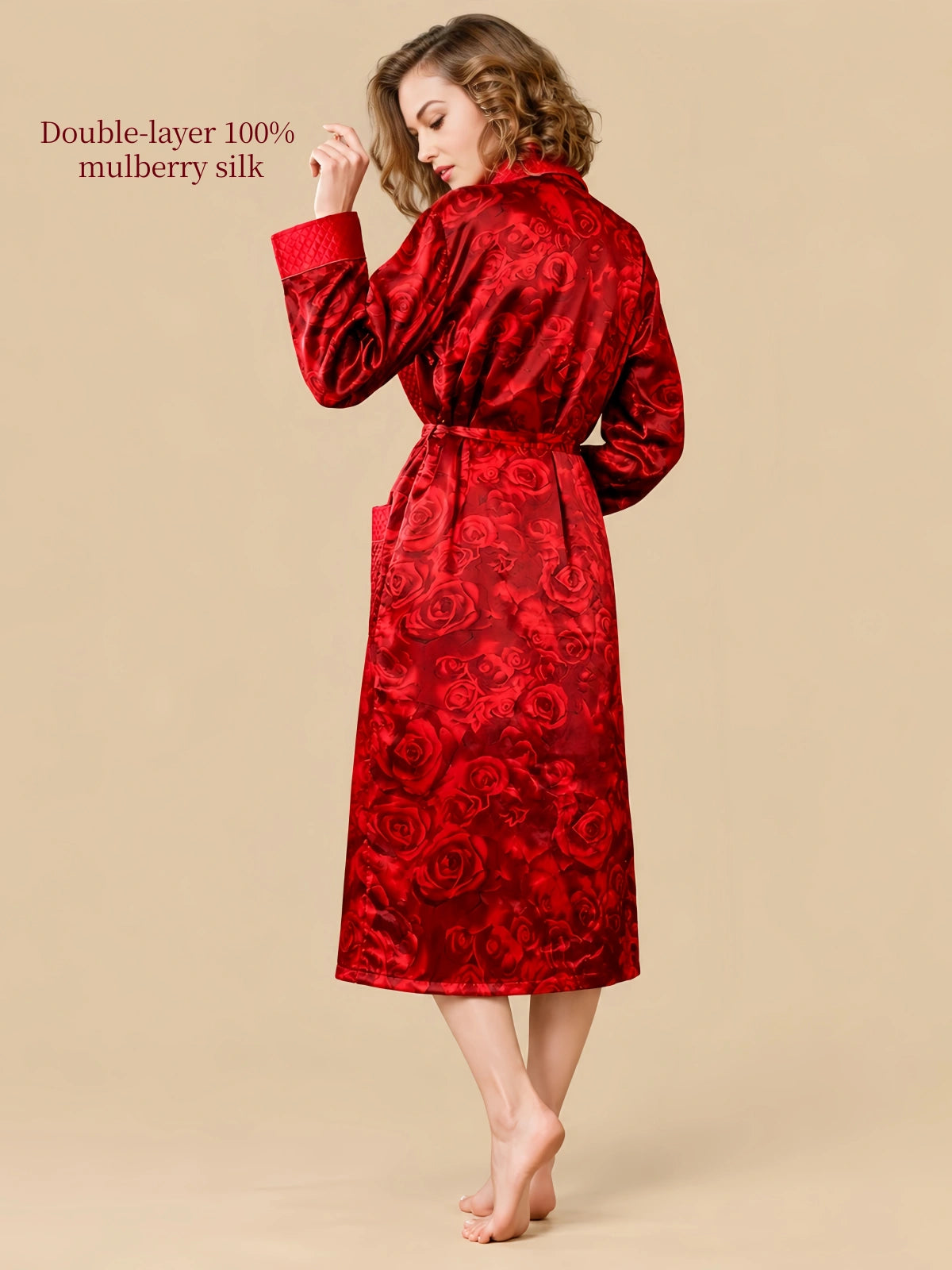Back view of Silkgala Red Rose 22 Momme mulberry silk robe showing the full rose jacquard pattern, long sleeves and waist belt.