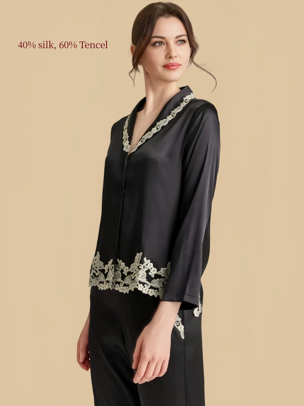 Side view of Silkgala black silk Tencel blend pajama set highlighting the lace-trim hem and relaxed fit.