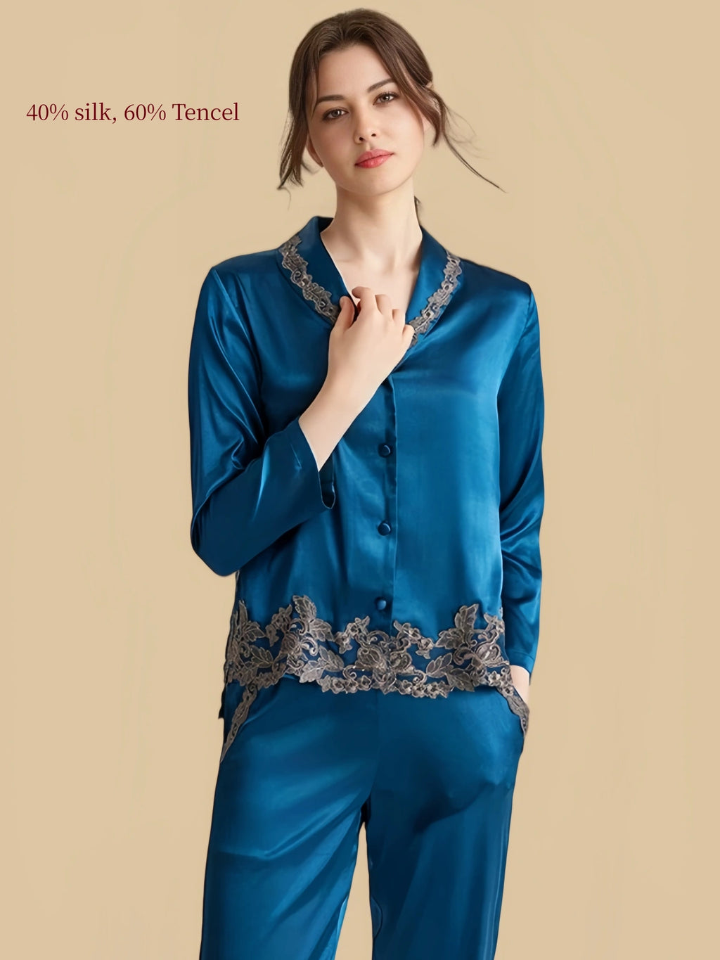 Close-up of Silkgala blue silk Tencel pajama top showing smooth fabric, buttons and lace-trim collar.