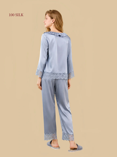 Back full-length view of Silver Mist Blue silk pajamas showing the ruffled collar and matching lace trim