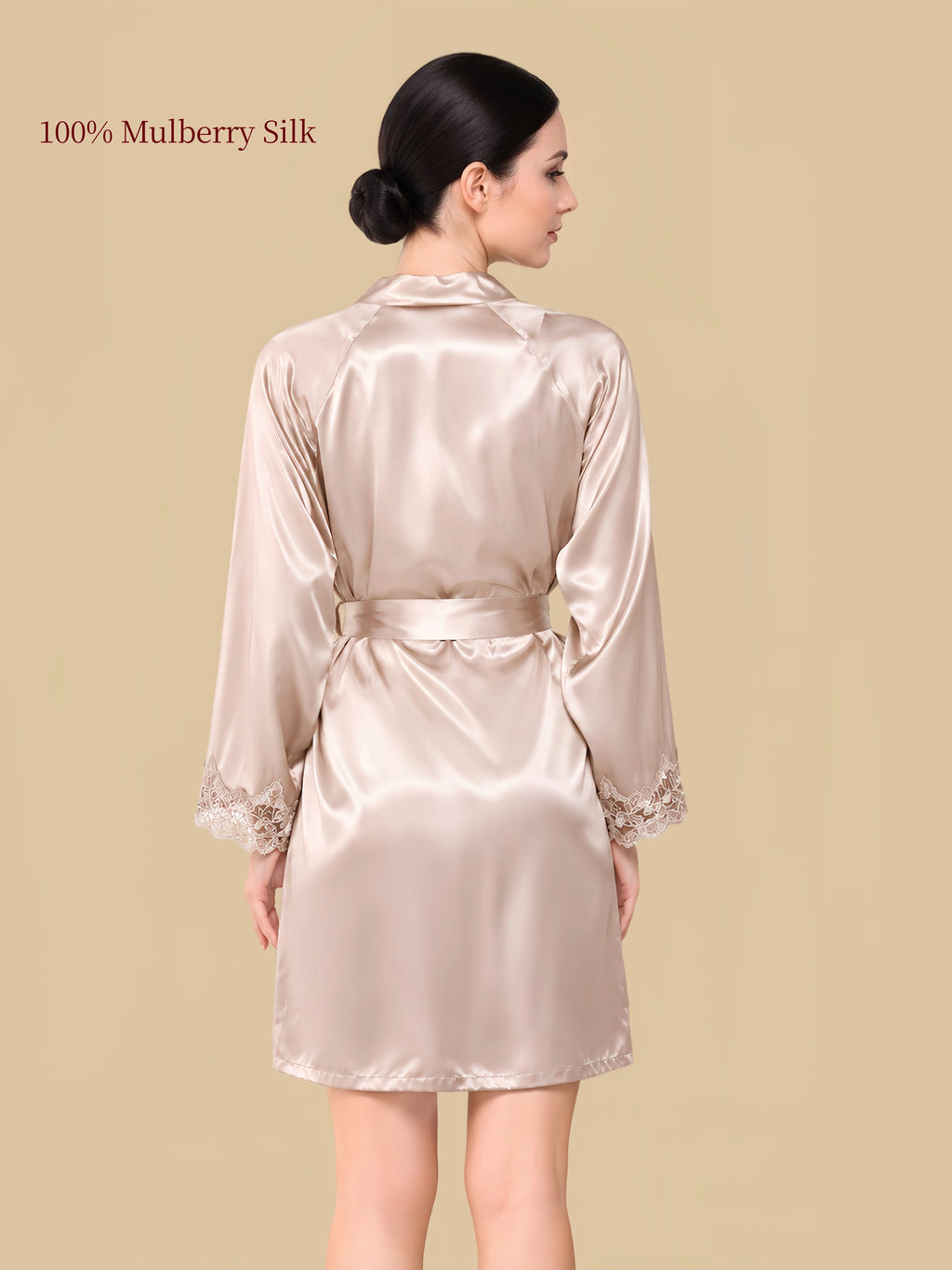 Back view of a skin-tone mulberry silk robe with matching waist belt and delicate floral lace cuffs.