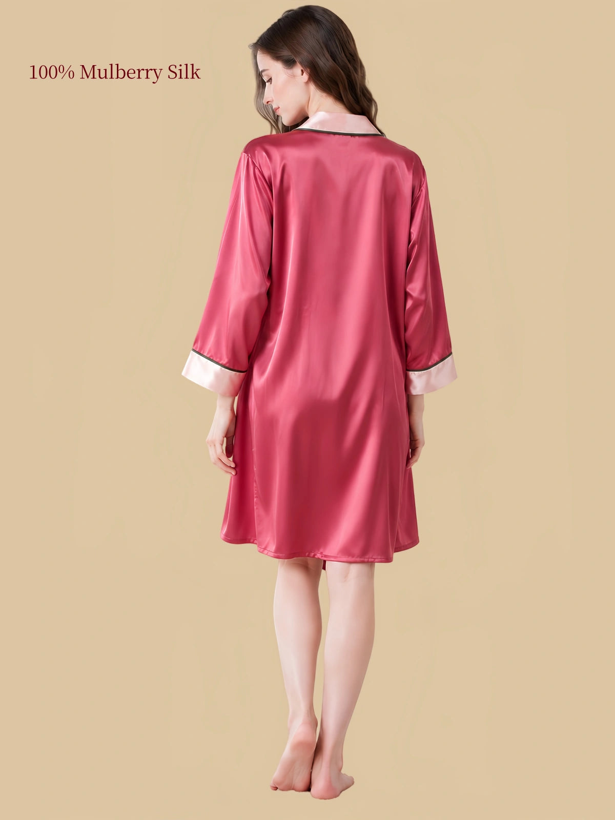 Back view of a Soft Red mulberry silk robe with smooth drape, three-quarter sleeves and pale pink contrast cuffs.