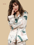 Champagne beige 19mm lapel pajamas front view with contrast welt pocket and button-front shirt
