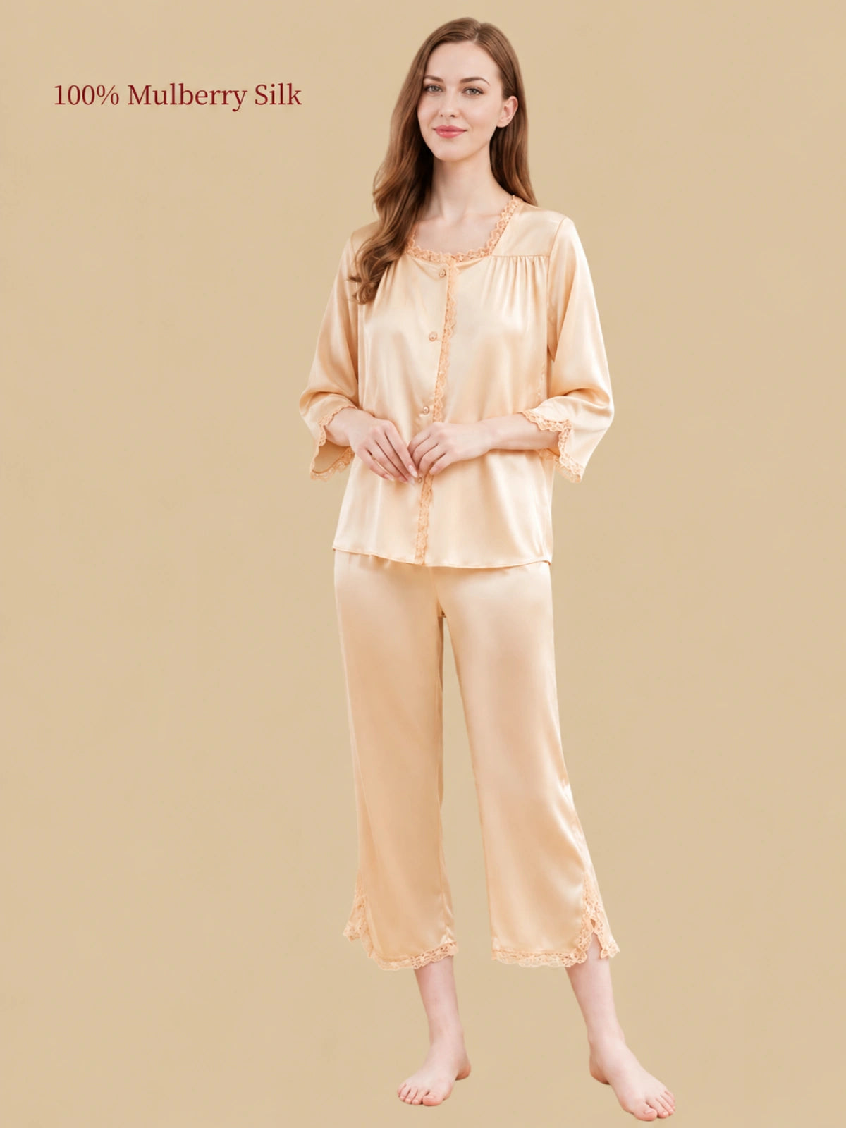 Full-length front view of Silkgala Wheat Gold mulberry silk pajamas featuring a vintage-inspired lace square neckline and relaxed calf-length pants.